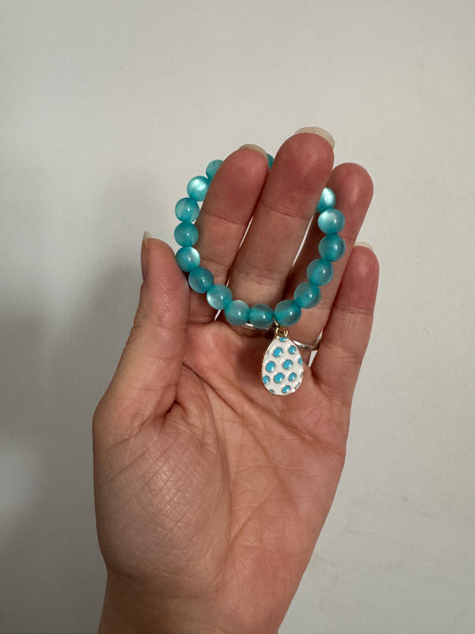 Mystery bracelet with charm